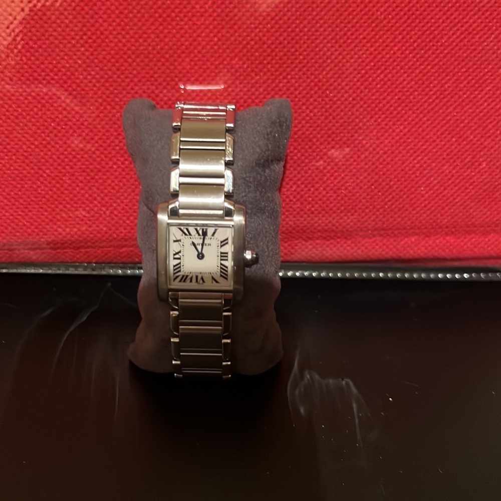 I’m selling my Cartier tank watch.  I’m moving and need some extra cash.